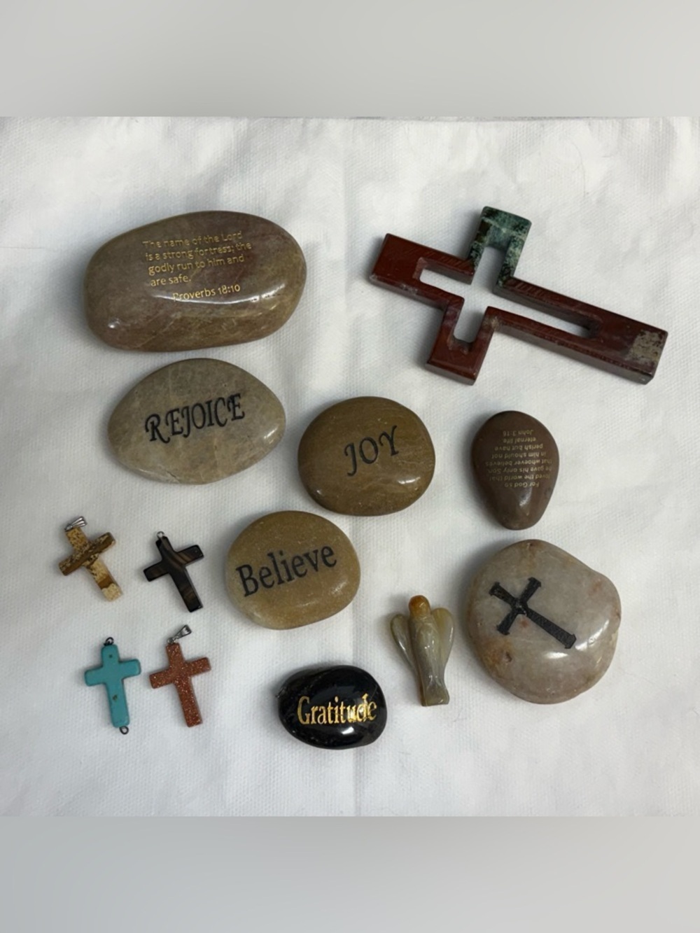Religious polished stones and crosses